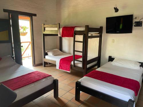 Hotel Verano Resort San Gilにあるベッド