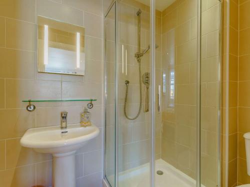 a bathroom with a shower and a sink at 2 bed in Tenby 88738 in Tenby
