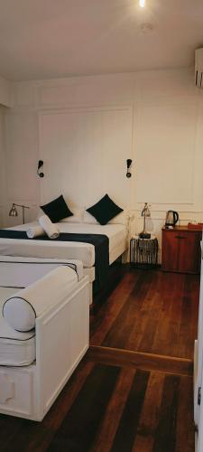 Un ou plusieurs lits dans un hébergement de l'établissement Grand Hotel Urban