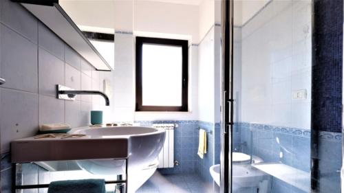 Ένα μπάνιο στο Ficus Plus - Pineto Vacanza