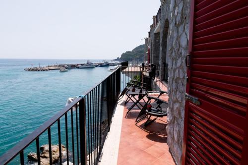 a balcony of a building with a view of the water at Villa Venere - Amalfi Coast - Private Sea Access in Cetara