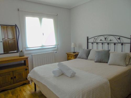 Katil atau katil-katil dalam bilik di Apartamento Zuhaitzondoa Etxea