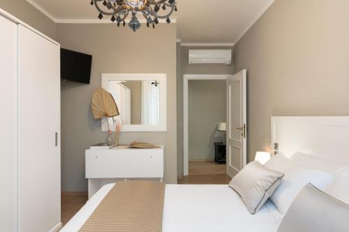 Cama o camas de una habitación en Torrigiani Apartments