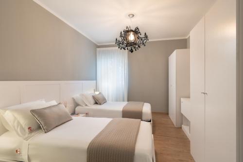 Cama o camas de una habitación en Torrigiani Apartments