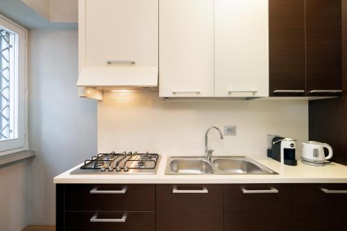 Una cocina o zona de cocina en Torrigiani Apartments