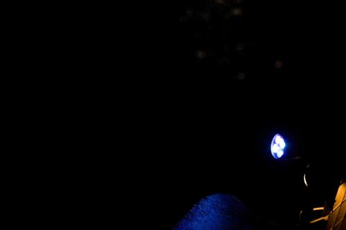 a person with a blue light in the dark at Villa Venere - Amalfi Coast - Private Sea Access in Cetara