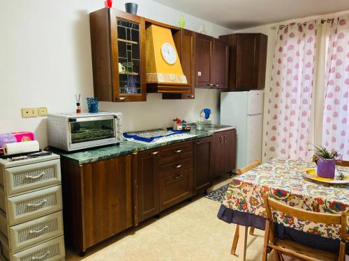 Kuchyňa alebo kuchynka v ubytovaní Casa vacanza Giusi