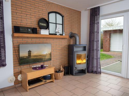 TV a/nebo společenská místnost v ubytování Apartment Deichperle-1 by Interhome