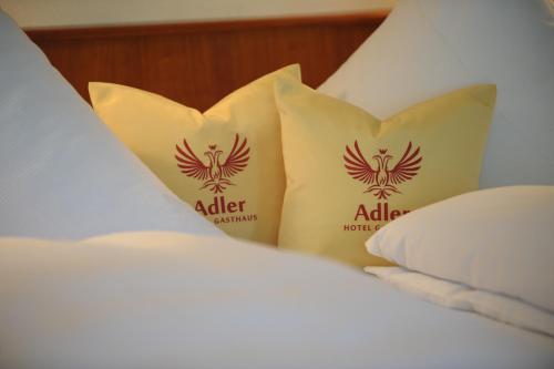 Postel nebo postele na pokoji v ubytování Hotel Gasthaus Adler