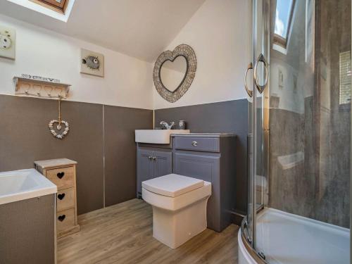 a bathroom with a toilet and a sink and a shower at 2 Bed in Gosforth SZ233 in Gosforth