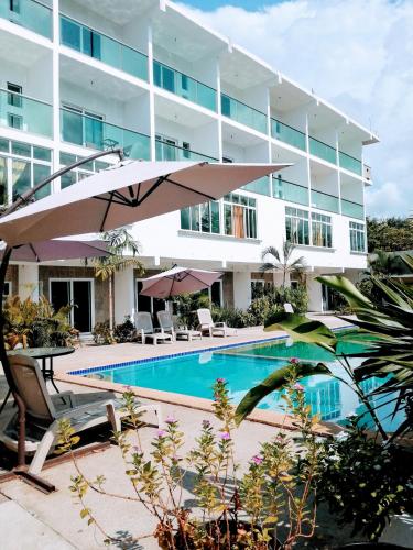 Bazén v ubytování Hotel Rega Suites Guayabitos - Family & Kitchen nebo v jeho okolí