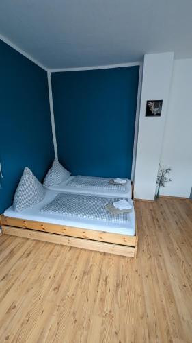 Katil atau katil-katil dalam bilik di Ferienwohnung Maiglöckchen