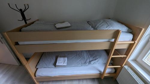 Katil atau katil-katil dalam bilik di Ferienwohnung Maiglöckchen
