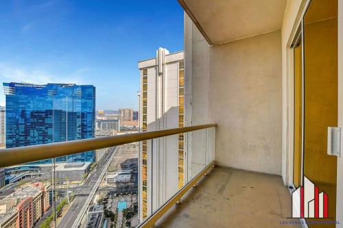 a balcony of a building with a view of a city at MGM Signature-38-617 Top floor F1 View Balcony in Las Vegas