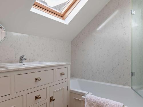 a bathroom with a sink and a shower at 1 Bed in Alderwasley 94394 in Alderwasley