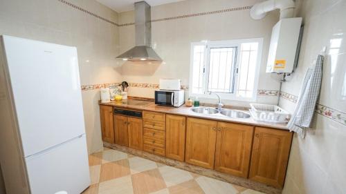 Η κουζίνα ή μικρή κουζίνα στο Casa Becquer 3 - Solo familias