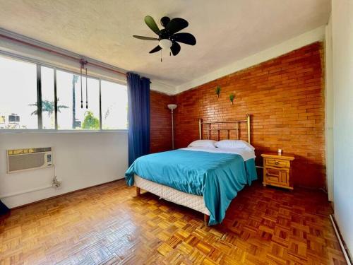 Ένα ή περισσότερα κρεβάτια σε δωμάτιο στο Casa acogedora y relajante en Cuernavaca