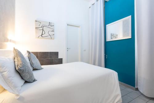 Ένα ή περισσότερα κρεβάτια σε δωμάτιο στο Trastevere Suites - Top Collection