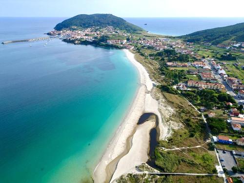 an aerial view of a beach and the ocean at Albergue de Sonia in Finisterre