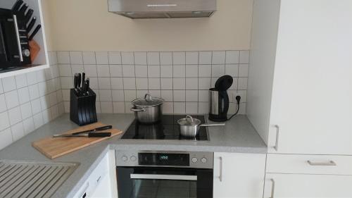 Η κουζίνα ή μικρή κουζίνα στο Claire's Apartment