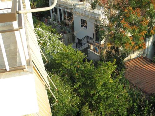 an aerial view of a house with trees and flowers at NICK STUDIOS previous NICK HOUSE in Plomarion