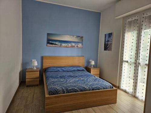 - une chambre avec un lit dans l'établissement La Casetta di Noi2, à Spotorno