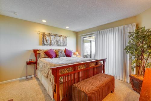 a bedroom with a bed and a window at Watsonville Condo with Ocean Views and Beach Access in Watsonville