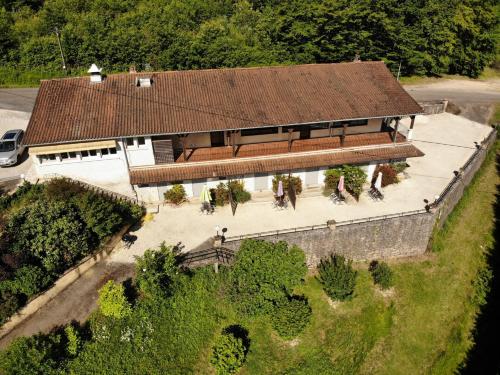 an overhead view of a house with a roof at Les hyacinthes 4 in Sarlat-la-Canéda