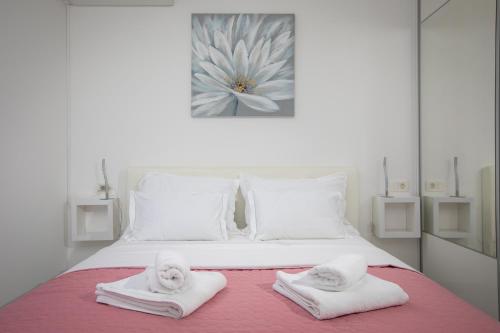 Ένα ή περισσότερα κρεβάτια σε δωμάτιο στο Sea View Apartments Dammi with free parking