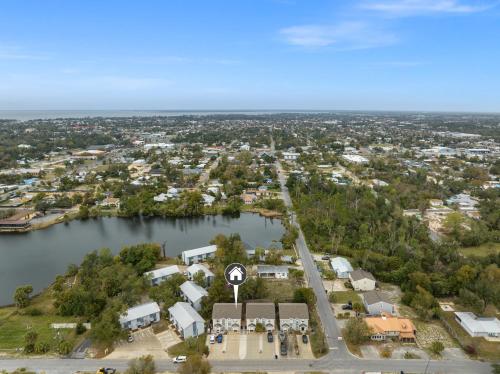 an aerial view of a town next to a body of water at 2 BR Home in St Andrews, Close to Everything in Panama City