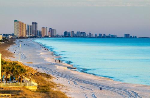 a view of a beach with a city in the background at 2 BR Home in St Andrews, Close to Everything in Panama City