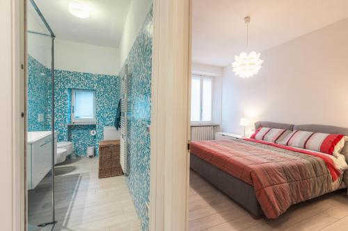 Postel nebo postele na pokoji v ubytování Moderno Appartamento Grande Comfort Como