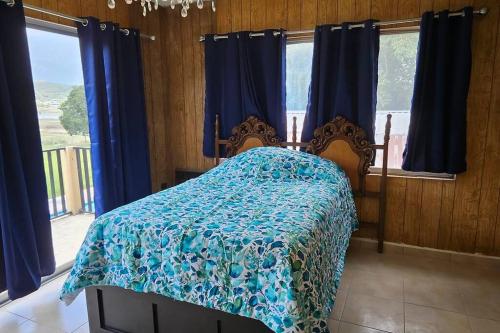 Кровать или кровати в номере Quinta Paraiso Presa de la boca