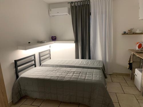 Postel nebo postele na pokoji v ubytování Casa l'Orologio