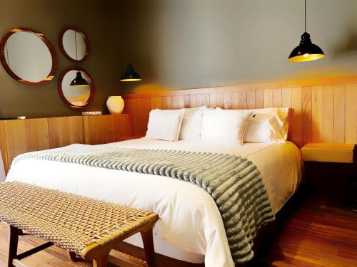 Postel nebo postele na pokoji v ubytování Bito's Hotel Boutique