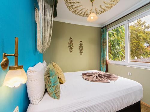 Кровать или кровати в номере Modern Sultan Hotel