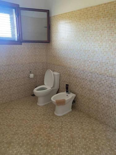 Ein Badezimmer in der Unterkunft Villa a tre piani.