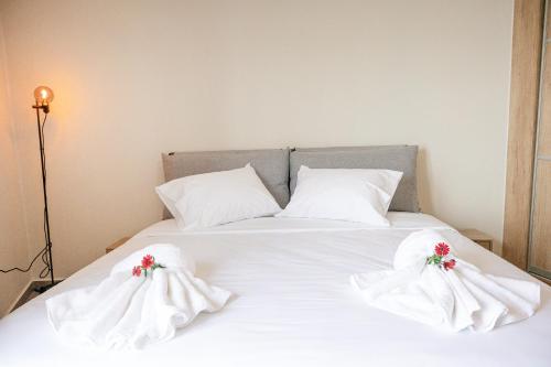 Postel nebo postele na pokoji v ubytování XENIOS APARTMENTS