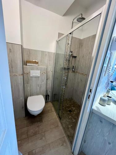 Koupelna v ubytování L'Albadu