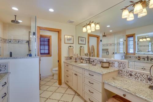 a bathroom with two sinks and a large mirror at Edwards Home in Cordillera Hot Tub, Mountain View in Edwards