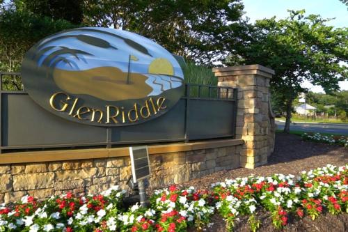 a sign for the city of philadelphia with flowers at Glen Riddle 102 in Berlin