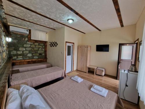 Postel nebo postele na pokoji v ubytování Hotel My House