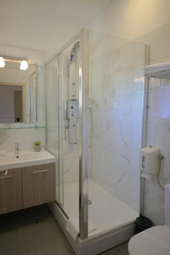 Ein Badezimmer in der Unterkunft Hotel Fortuna