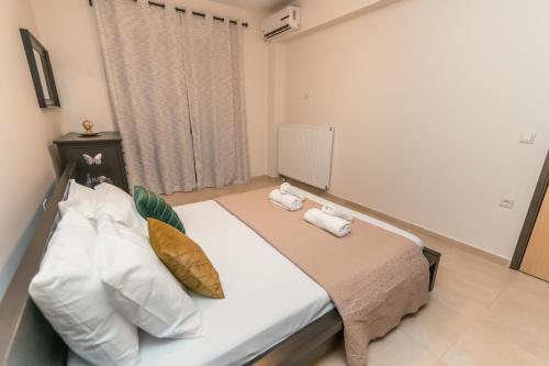 Ένα ή περισσότερα κρεβάτια σε δωμάτιο στο AirZen