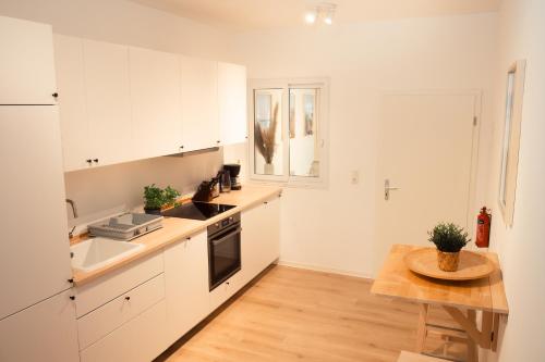 Η κουζίνα ή μικρή κουζίνα στο Wohlfühloase im Loftstil