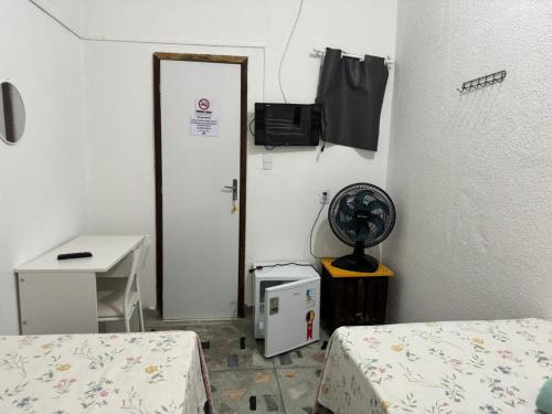 Katil atau katil-katil dalam bilik di Casa do Meio Pousada