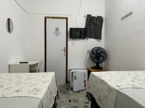 Katil atau katil-katil dalam bilik di Casa do Meio Pousada