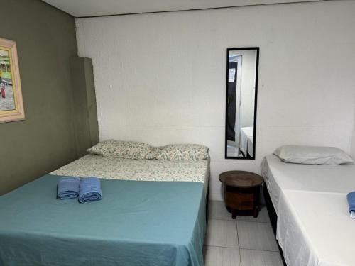 Katil atau katil-katil dalam bilik di Casa do Meio Pousada