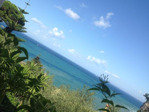 a view of the ocean from the beach at Bilocale panoramico “Lo sguardo” in Massa Lubrense