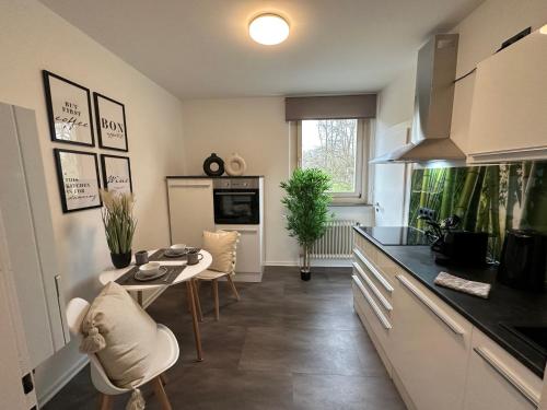 Kuchyň nebo kuchyňský kout v ubytování CityAppartLuxe am Hofgarten - zwischen Uni und Stadt-Zentrum